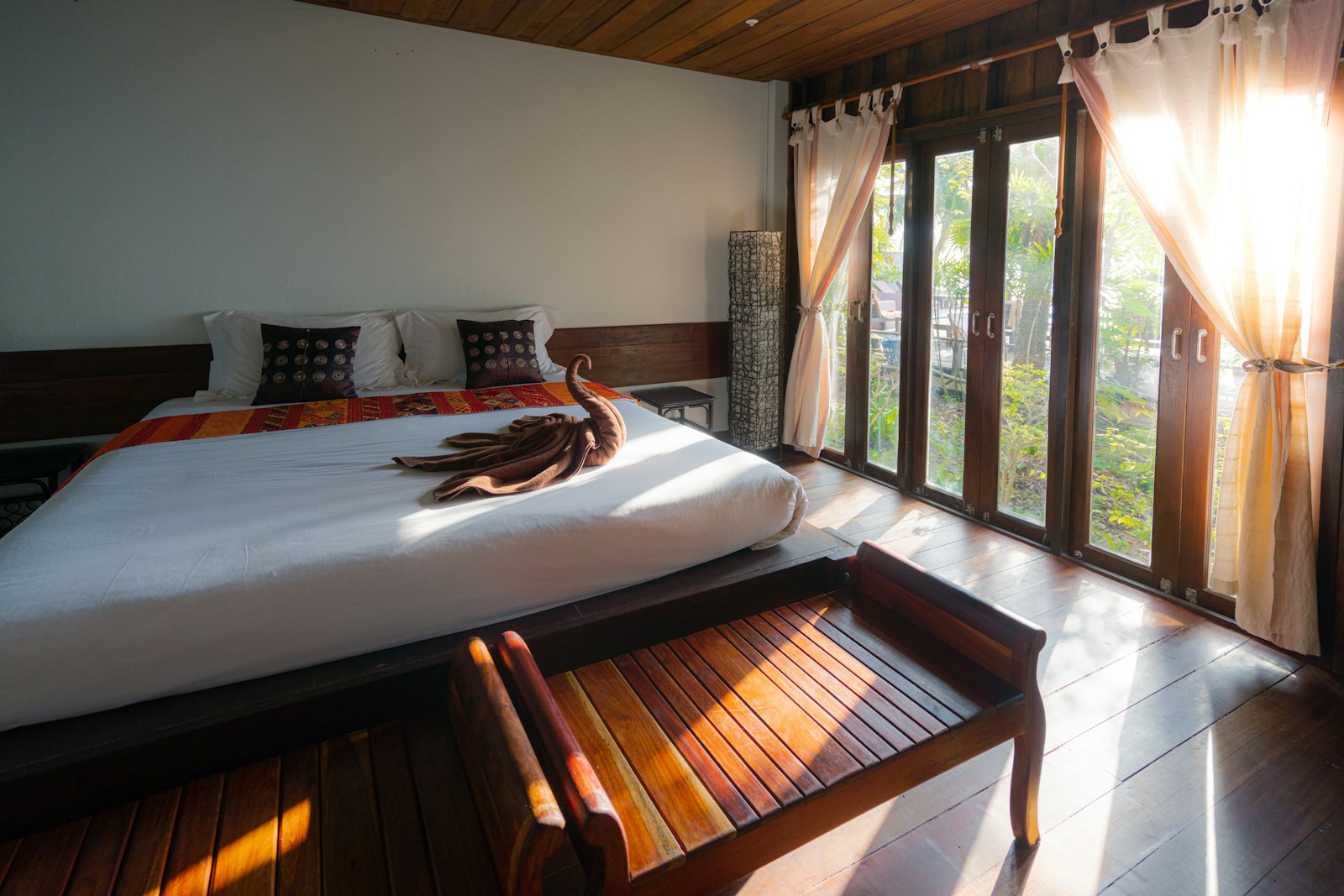A hotel bathroom with stone and linen — atmosphere, not this lodge